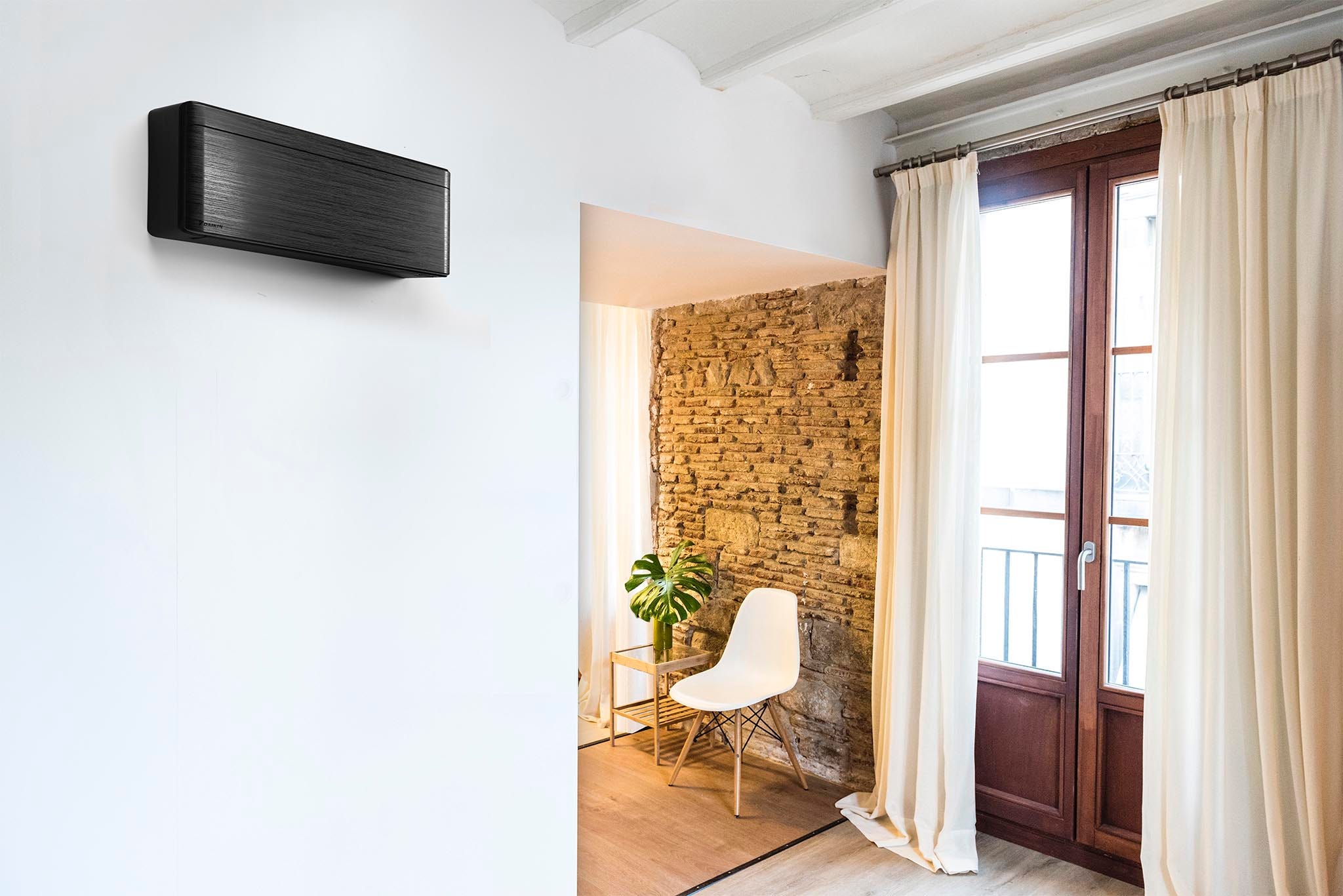 A living room with a mounted Daikin installation